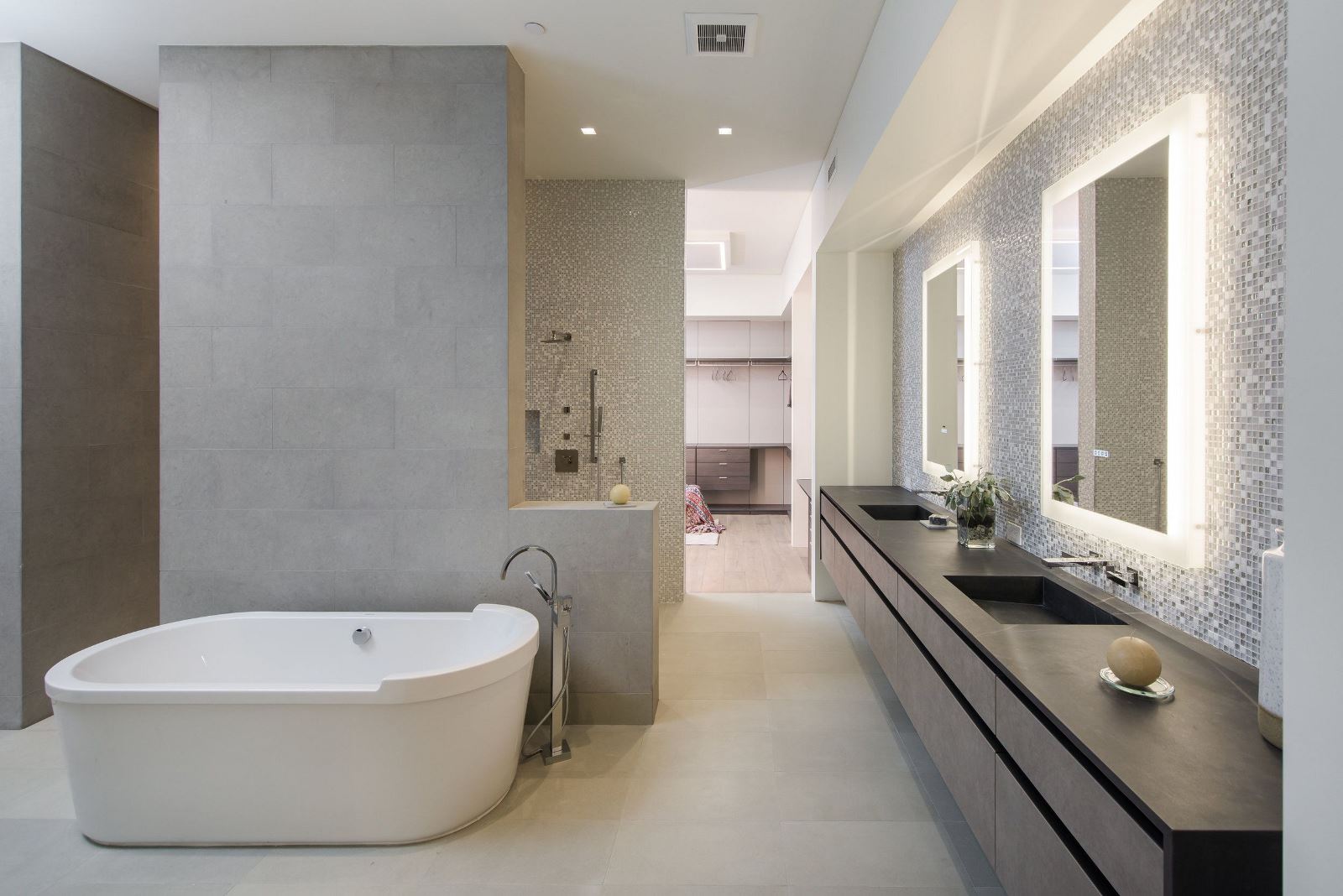 An industrial shower is all about embracing a unique and contemporary aesthetic in your bathroom. This style utilizes materials like metal, concrete, and brick to create an edgy and raw look that is both bold and modern. One way to incorporate this style into your shower design is to use exposed pipes or plumbing fixtures for a rugged and utilitarian feel. You can also use concrete or brick tiles for the walls and floor to create an industrial vibe. Another great idea is to incorporate metallic accents, such as a steel-framed shower door or brass showerhead, to add a touch of shine and contrast to the overall design.