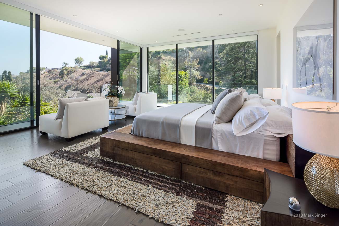 Add warmth to the bedroom by placing a patterned rug underneath the bed. Whether you choose a local carpet or a full floor carpet, it is a good idea and will give you a different feeling, towards the common goal of bringing warmth and comfort to you from the top to toe. Note the choice of colors and textures to your liking so that a bedroom is always a place of absolute relaxation.