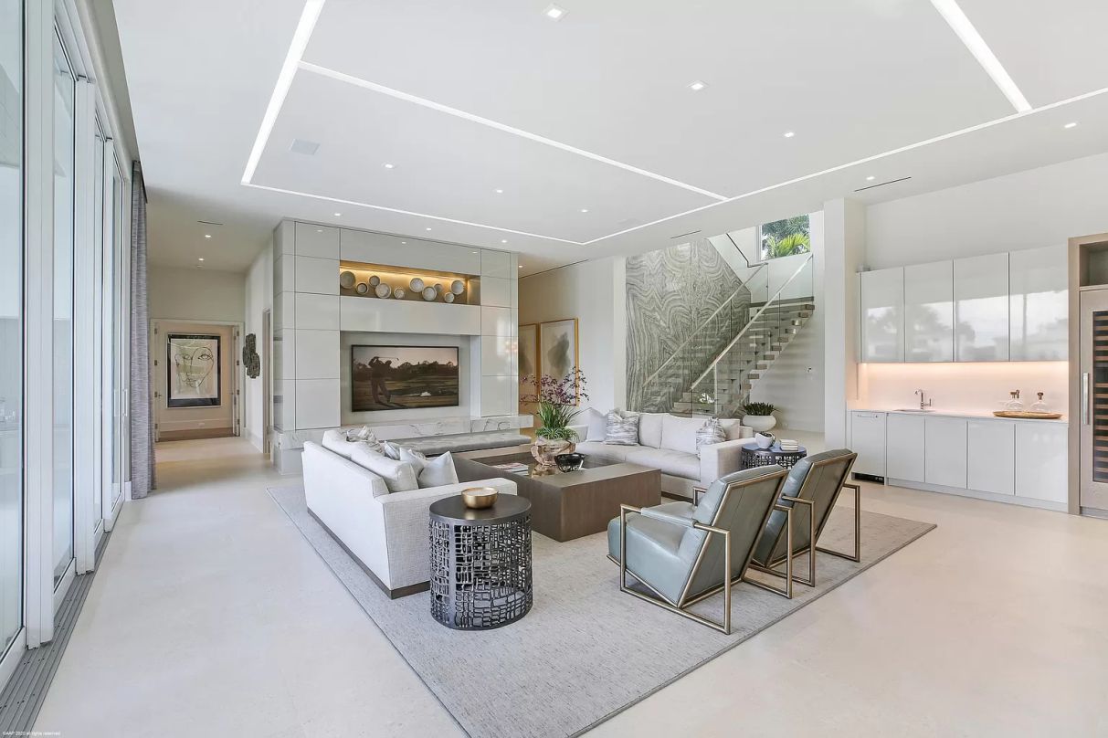 To give the illusion of more space, we can utilize a rug that is larger than the total amount of seating. It's a myth that a smaller rug makes a room appear larger; in reality, a smaller rug might make a space appear a little more disjointed. We adore cozy, unified spaces created when all the furniture is placed on the rug.