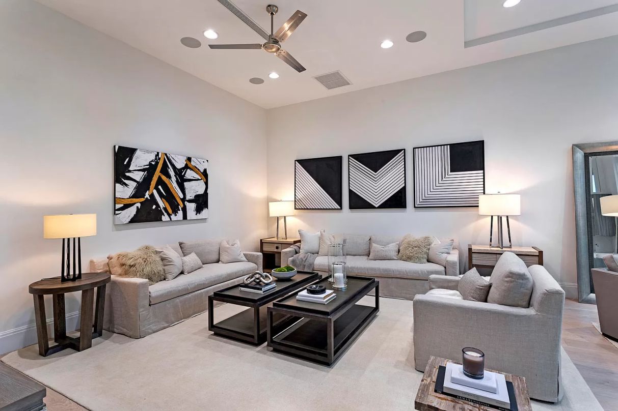 A stunning lighting fixture isn't just for the dining room. The most stunning multi-bulb display item in this living area elevates and individualizes the space as a whole.