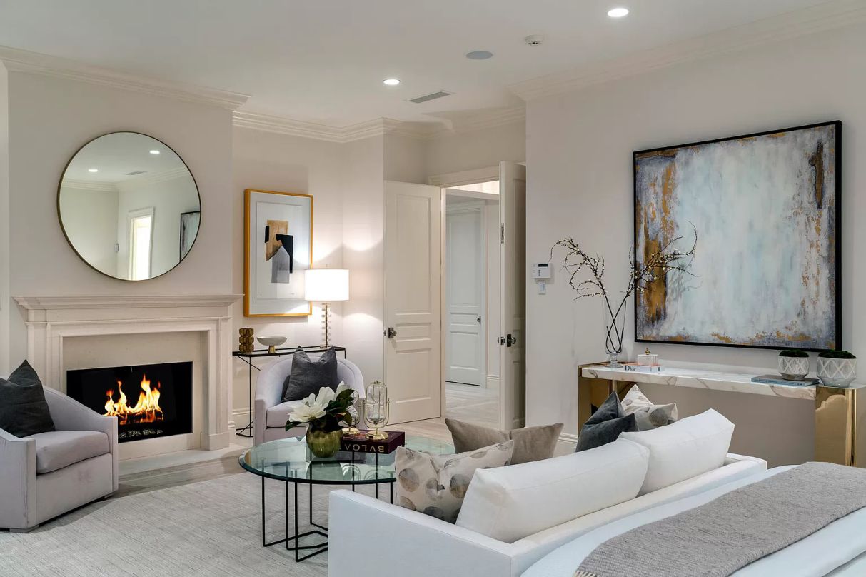 A beautiful décor choice for any living area is a wall mirror. Wall mirrors are available in a variety of designs and hues to suit your preferences, whether you're looking for a plain mirror with thin borders or a beautiful mirror that serves as the focal point of your space. Wall mirrors will enlarge the appearance of a tiny living room by reflecting light across the space.