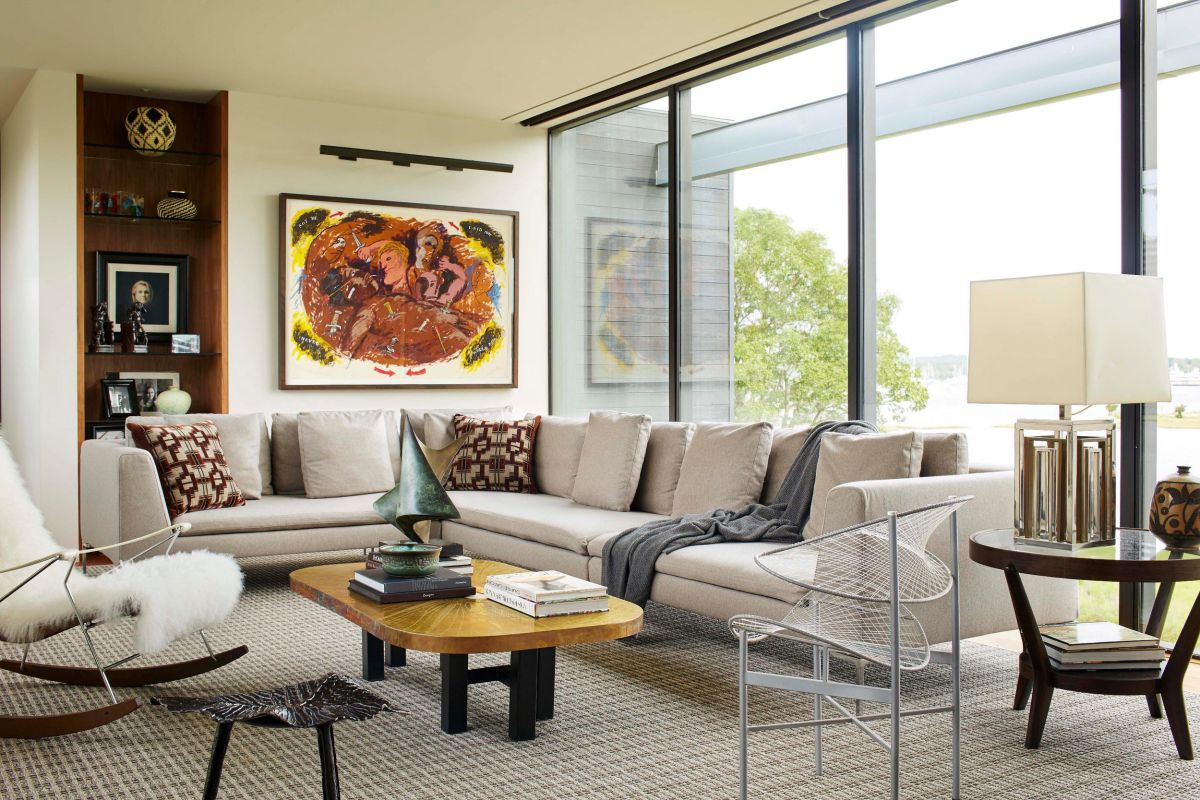 Every living room needs a focal point to capture attention. This could be a fireplace, large arts, a fabulous chandelier or a large window. Make sure your living room seating is arranged around this focal point. This will help make your living room decor a better chill out zone when you spend time with friends and family. Layer it with some cool fluffy pillows, blankets, and decorative lighting so your guests will feel welcomed.