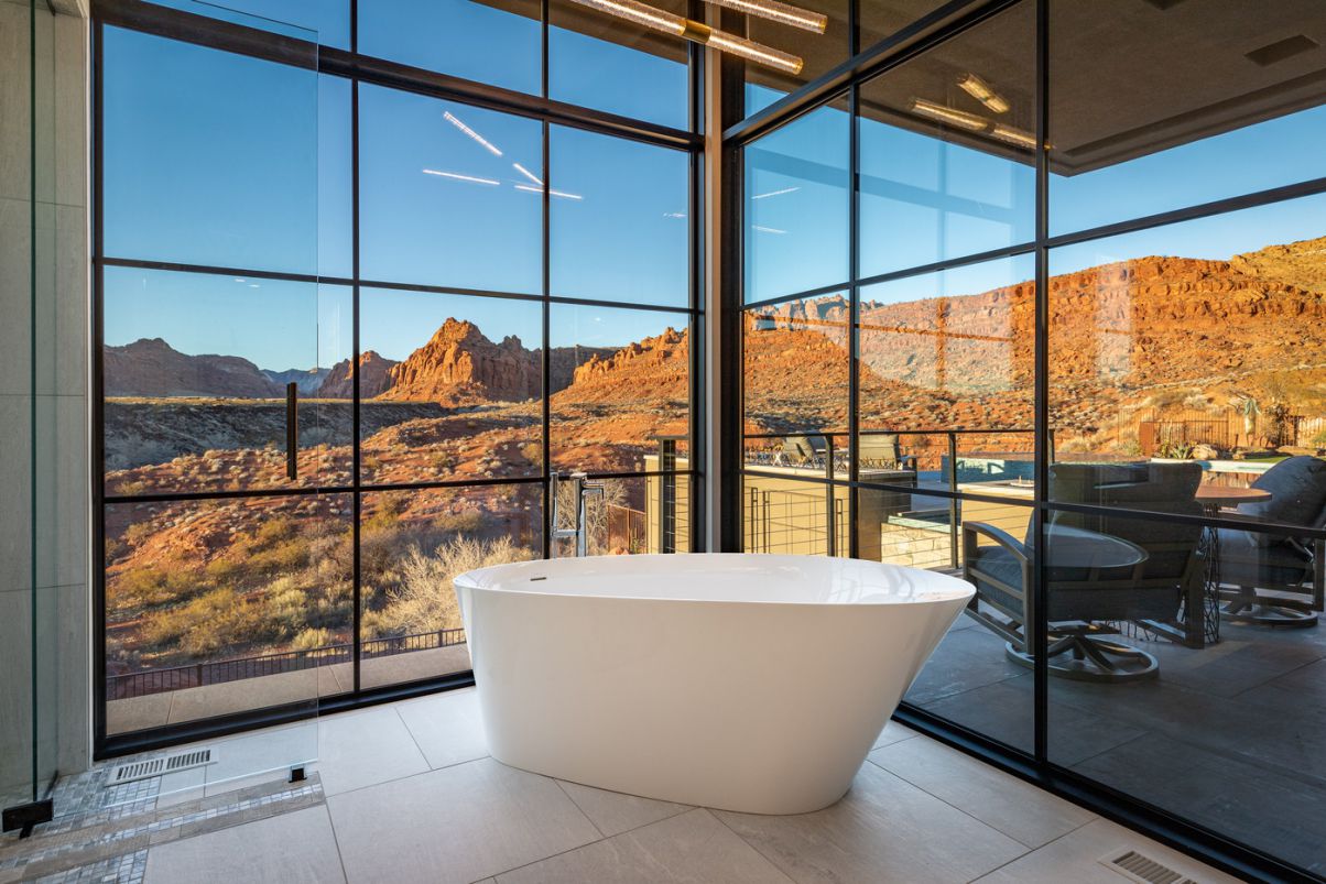 Allow plenty of natural light into your bathroom to bring out the best in it. Windows are vital in bathrooms because natural light fills the area with warmth.
 Of course, adding a new window is a difficult task, so concentrate on making the most of the ones you already have: Keep your curtains drawn, your blinds rolled up, and your windowpanes spotless.