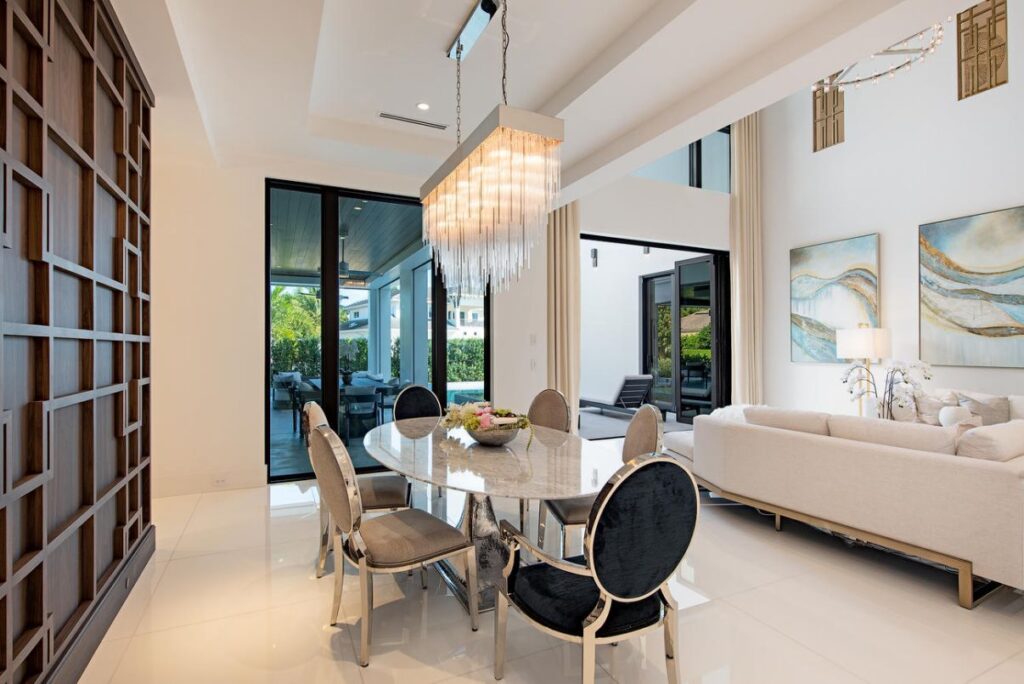 Forrest Lane Residence is a luxurious Florida Mansion now available for sale; this home located in prestigious Aqualane Shores, Naples, Florida offers 5 bedrooms and 7 bathrooms.