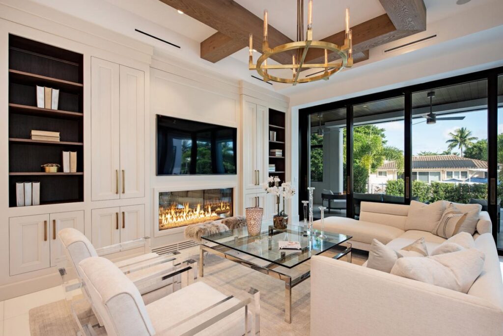 Forrest Lane Residence is a luxurious Florida Mansion now available for sale; this home located in prestigious Aqualane Shores, Naples, Florida offers 5 bedrooms and 7 bathrooms.