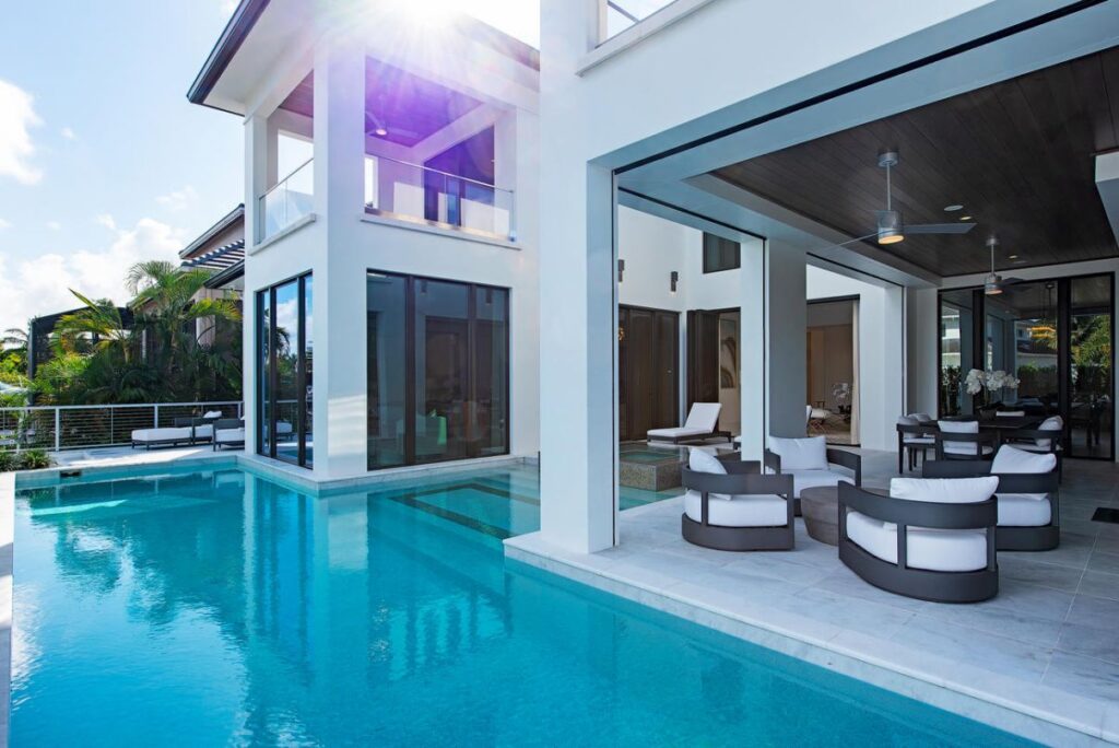 Forrest Lane Residence is a luxurious Florida Mansion now available for sale; this home located in prestigious Aqualane Shores, Naples, Florida offers 5 bedrooms and 7 bathrooms.