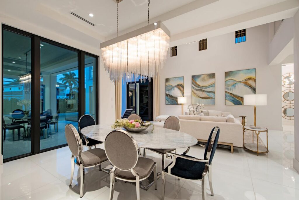 Forrest Lane Residence is a luxurious Florida Mansion now available for sale; this home located in prestigious Aqualane Shores, Naples, Florida offers 5 bedrooms and 7 bathrooms.