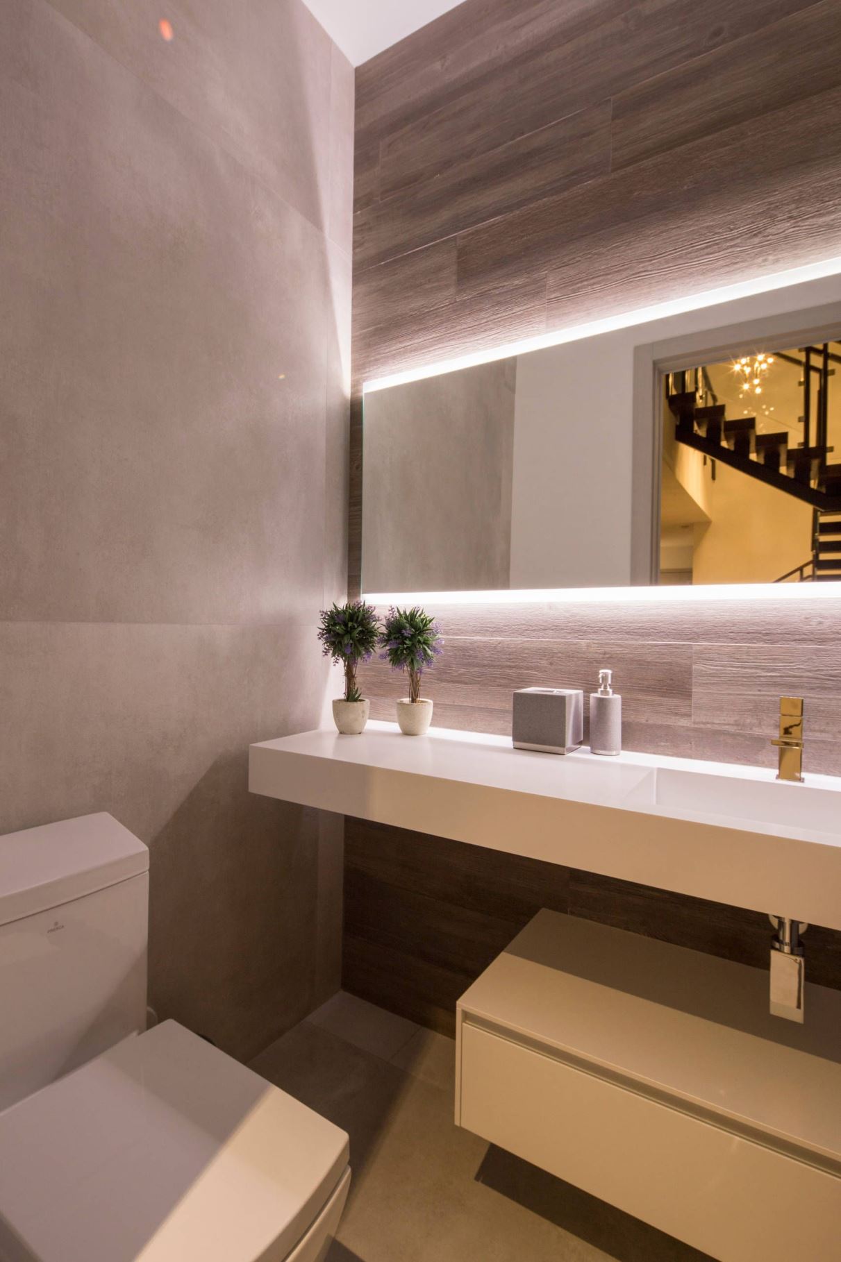 Color isn't off-limits in your all-white bathroom, but if you want to keep the area primarily white, choose a single accent color and stick with it. Colors that are subtle, such as beige or gray, are good.
 If you prefer to use color, I recommend light or medium tones to avoid a sudden contrast.