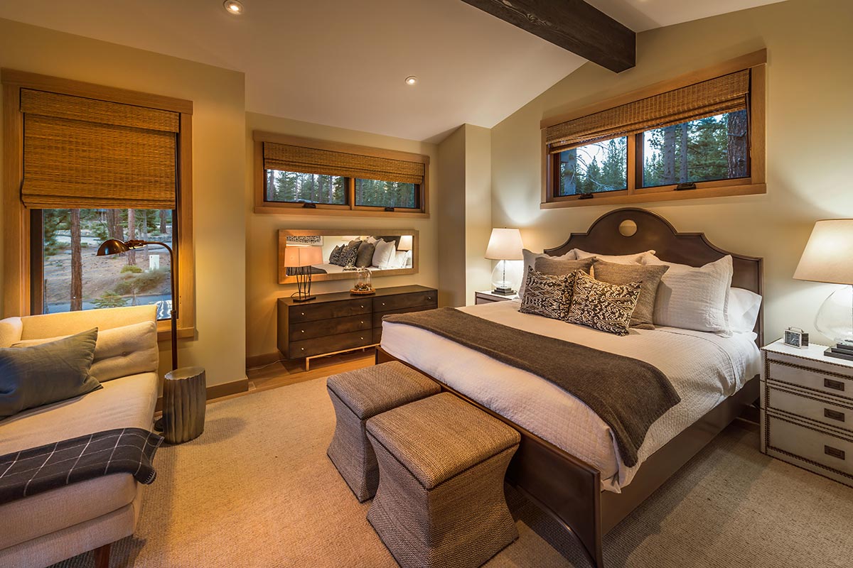 You won't be let down by these rustic farmhouse bedroom designs. Using wood doesn't require you to go all out. Start by giving the walls a limewash. Beams on the ceiling will do the work for the wood aspect. To prevent the ceiling from becoming too crowded, make sure to allow enough space between the beams.