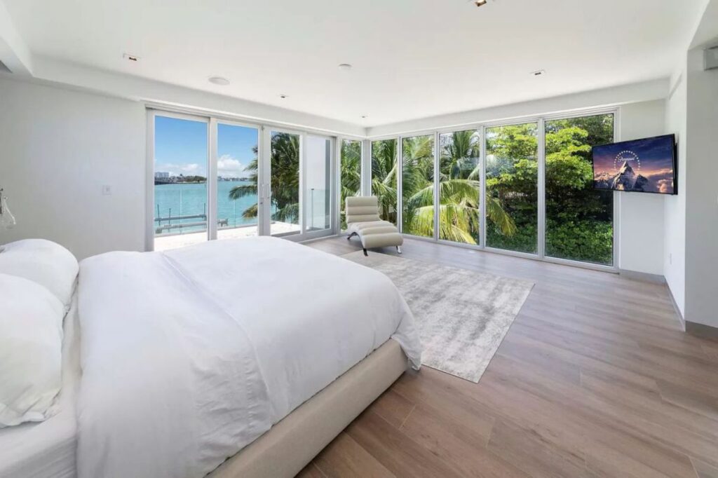 A $9,590,000 Bay Harbor Islands Home for Sale features Wide Bay Views