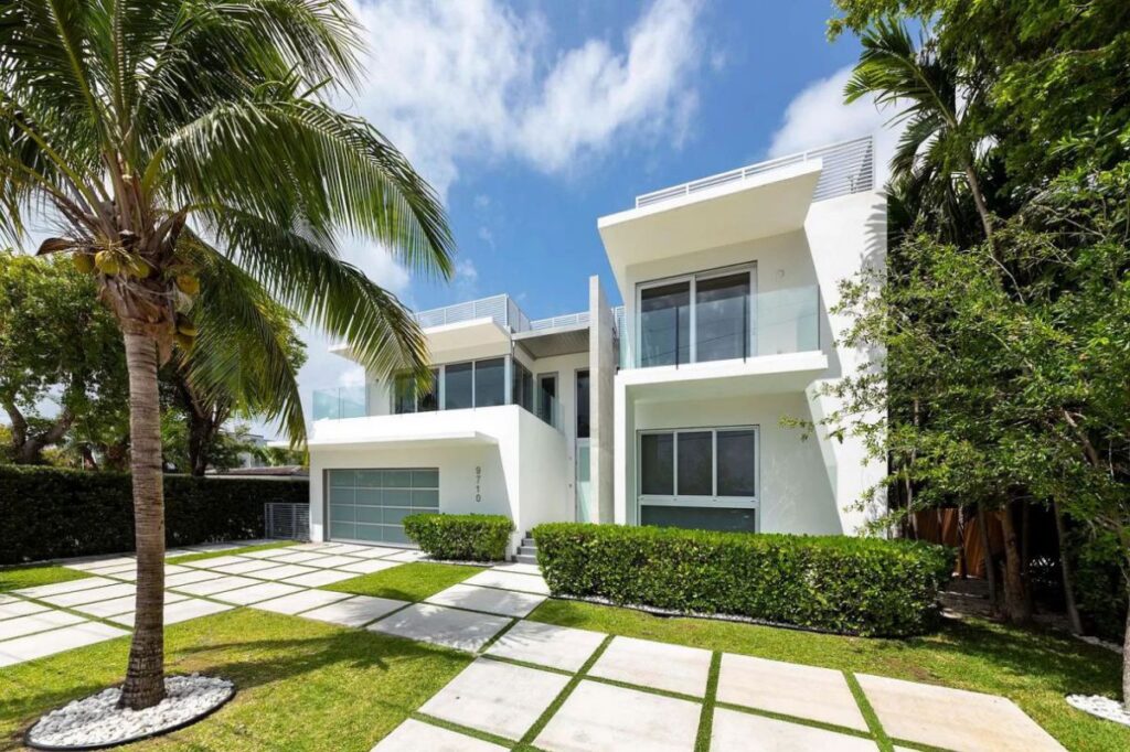 A $9,590,000 Bay Harbor Islands Home for Sale features Wide Bay Views