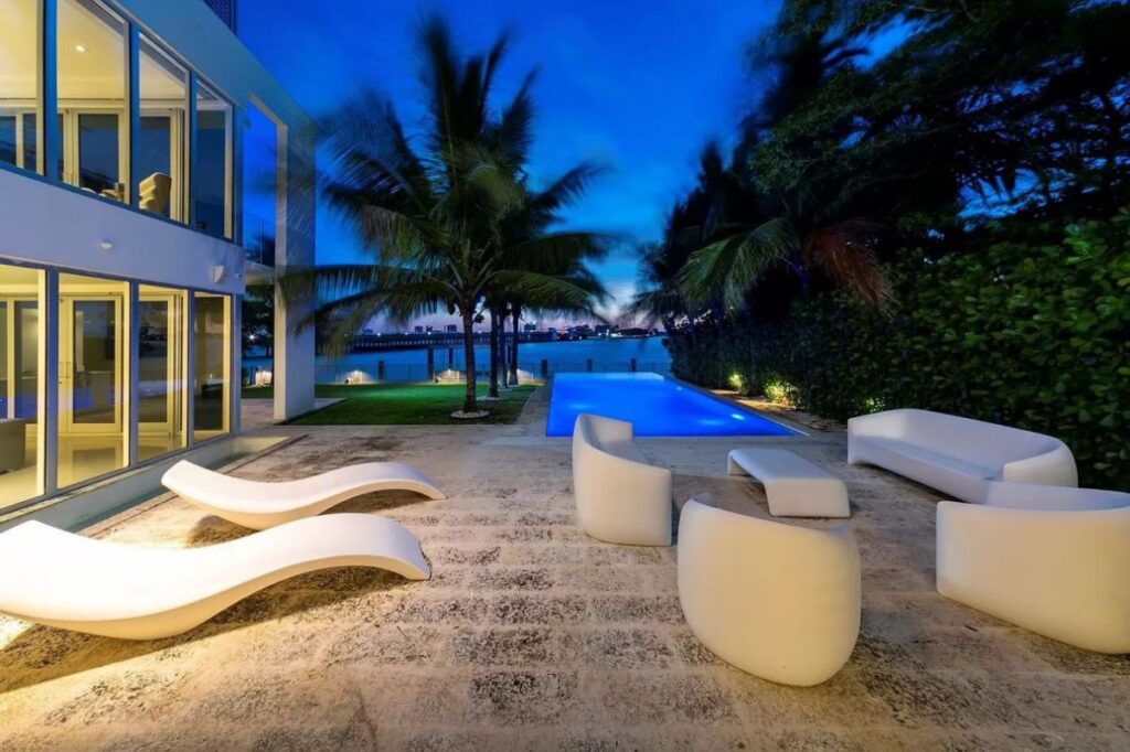 A $9,590,000 Bay Harbor Islands Home for Sale features Wide Bay Views