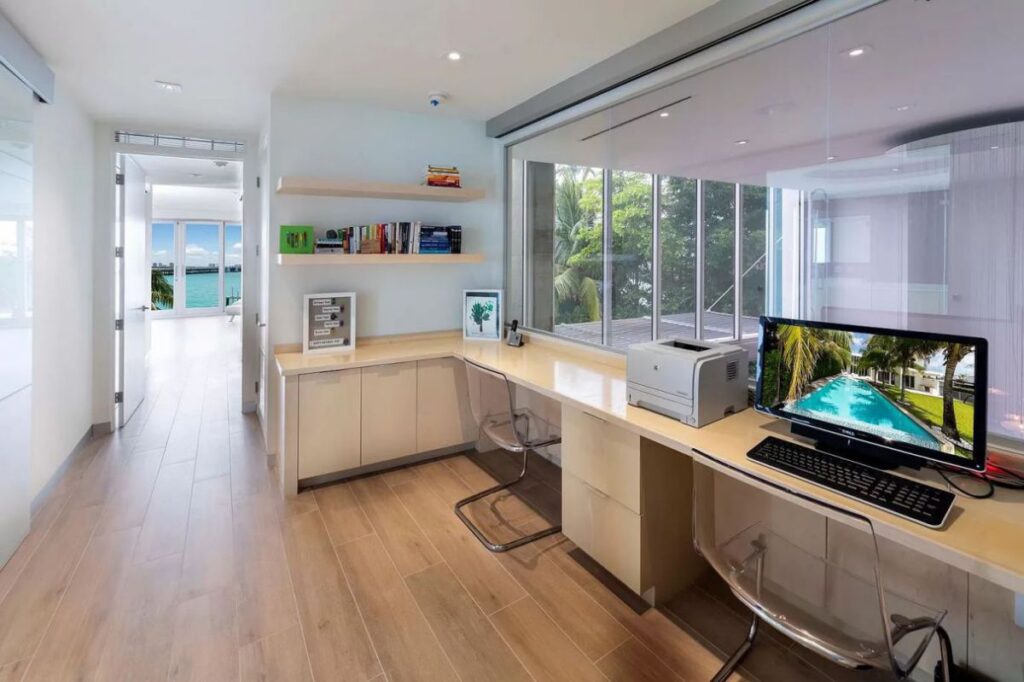 A $9,590,000 Bay Harbor Islands Home for Sale features Wide Bay Views