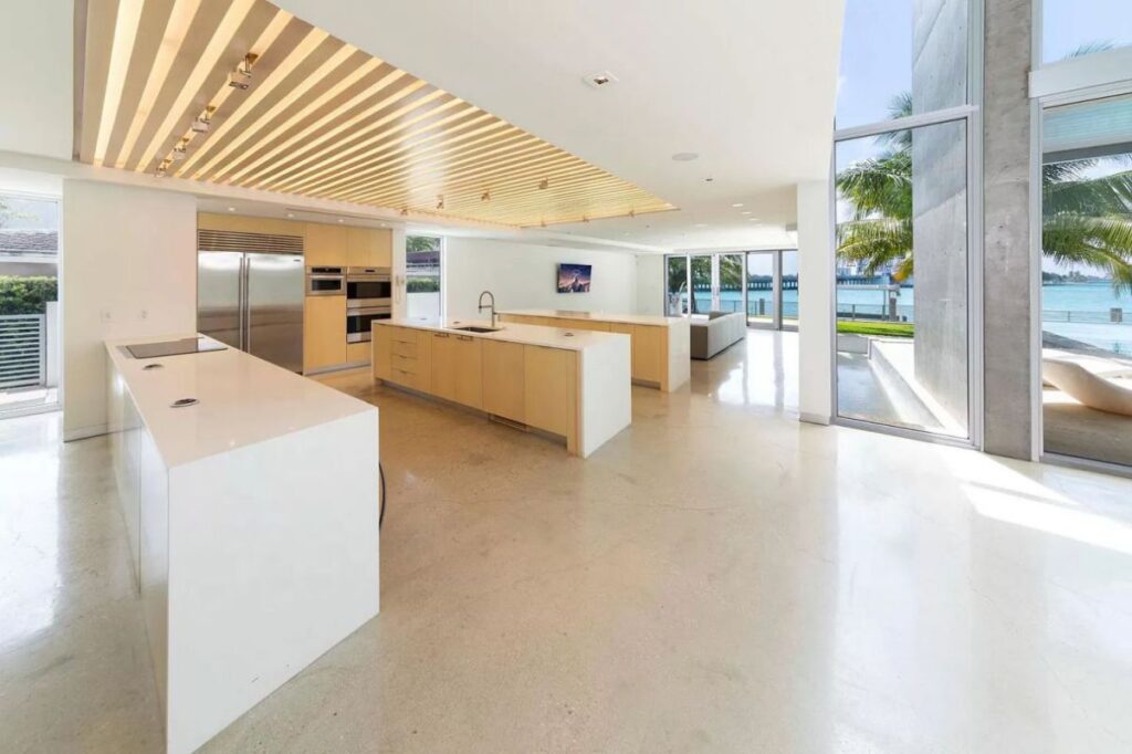A $9,590,000 Bay Harbor Islands Home for Sale features Wide Bay Views