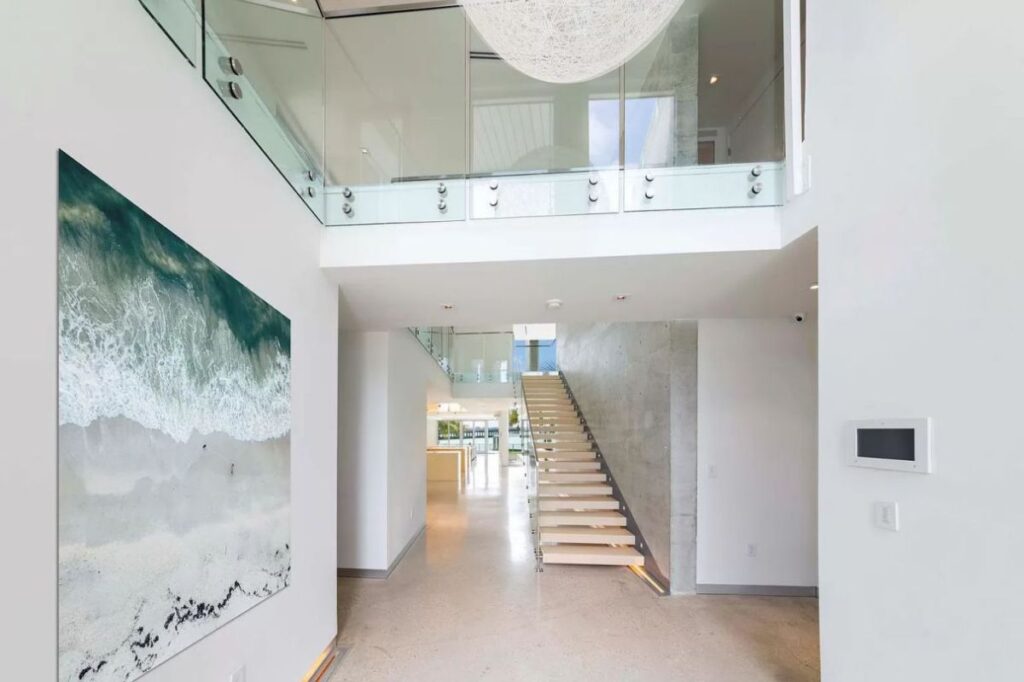 A $9,590,000 Bay Harbor Islands Home for Sale features Wide Bay Views
