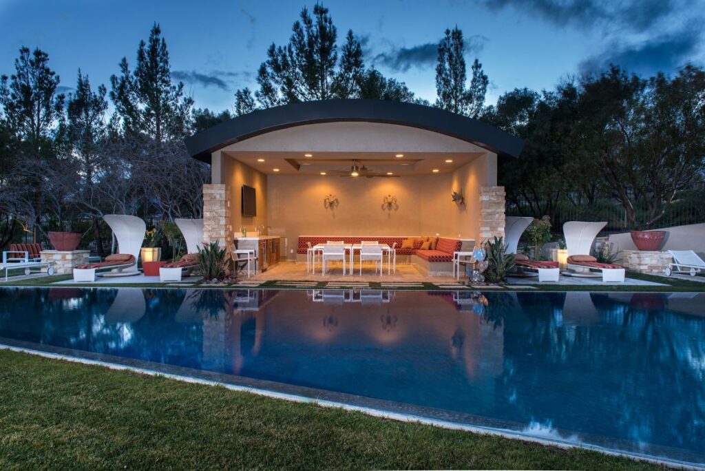 The Las Vegas Home for Sale is a luxuriously expansive and private estate in Summerlin now available for sale. This home located at 99 Hawk Ridge Dr, Las Vegas, Nevada; offering 8 bedrooms and 10 bathrooms with over 13,400 square feet of living spaces