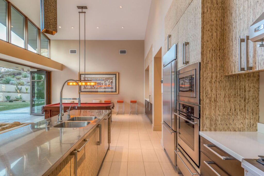 The Las Vegas Home for Sale is a luxuriously expansive and private estate in Summerlin now available for sale. This home located at 99 Hawk Ridge Dr, Las Vegas, Nevada; offering 8 bedrooms and 10 bathrooms with over 13,400 square feet of living spaces