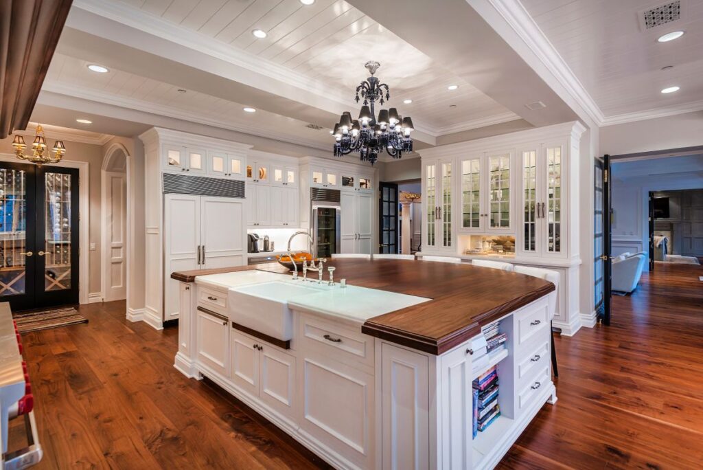 The Hamptons Style House is a Epic custom landmark estate with complete privacy and unobstructed fairway, lakes and mountain views now available for sale. This home located at 224 W Stafford Rd, Thousand Oaks, California; offering 5 bedrooms and 8 bathrooms with over 10,700 square feet of living spaces.