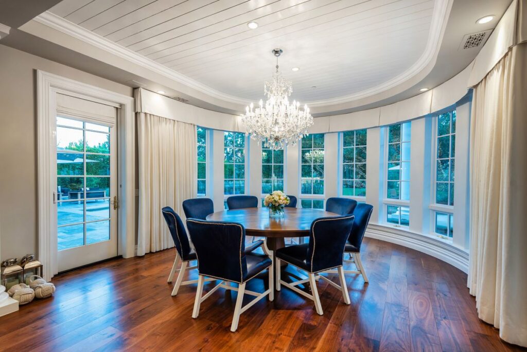 The Hamptons Style House is a Epic custom landmark estate with complete privacy and unobstructed fairway, lakes and mountain views now available for sale. This home located at 224 W Stafford Rd, Thousand Oaks, California; offering 5 bedrooms and 8 bathrooms with over 10,700 square feet of living spaces.