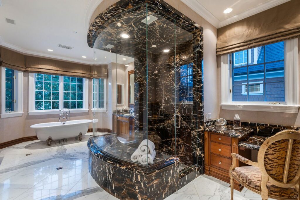 The Hamptons Style House is a Epic custom landmark estate with complete privacy and unobstructed fairway, lakes and mountain views now available for sale. This home located at 224 W Stafford Rd, Thousand Oaks, California; offering 5 bedrooms and 8 bathrooms with over 10,700 square feet of living spaces.
