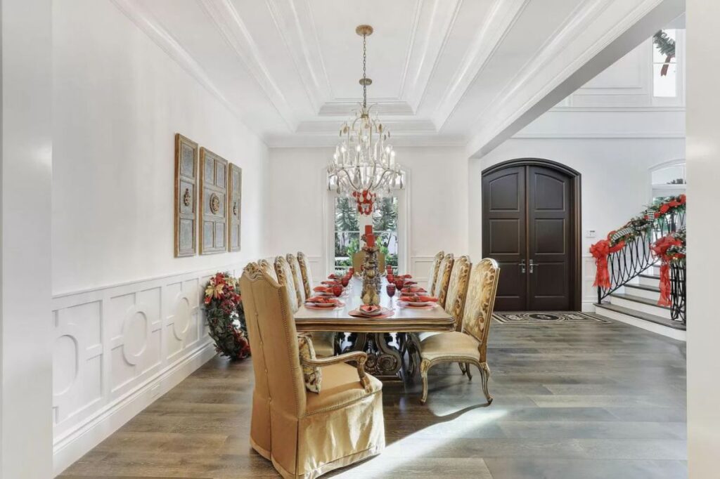 The Home for Sale in Boca Raton is a luxurious home with with specimen palms, is prelude to an up-lit mature tropical landscape, hedged and gated for privacy. This home located at 1717 Sabal Palm Dr, Boca Raton, Florida; offering 5 bedrooms and 9 bathrooms with over 6,800 square feet of living spaces.