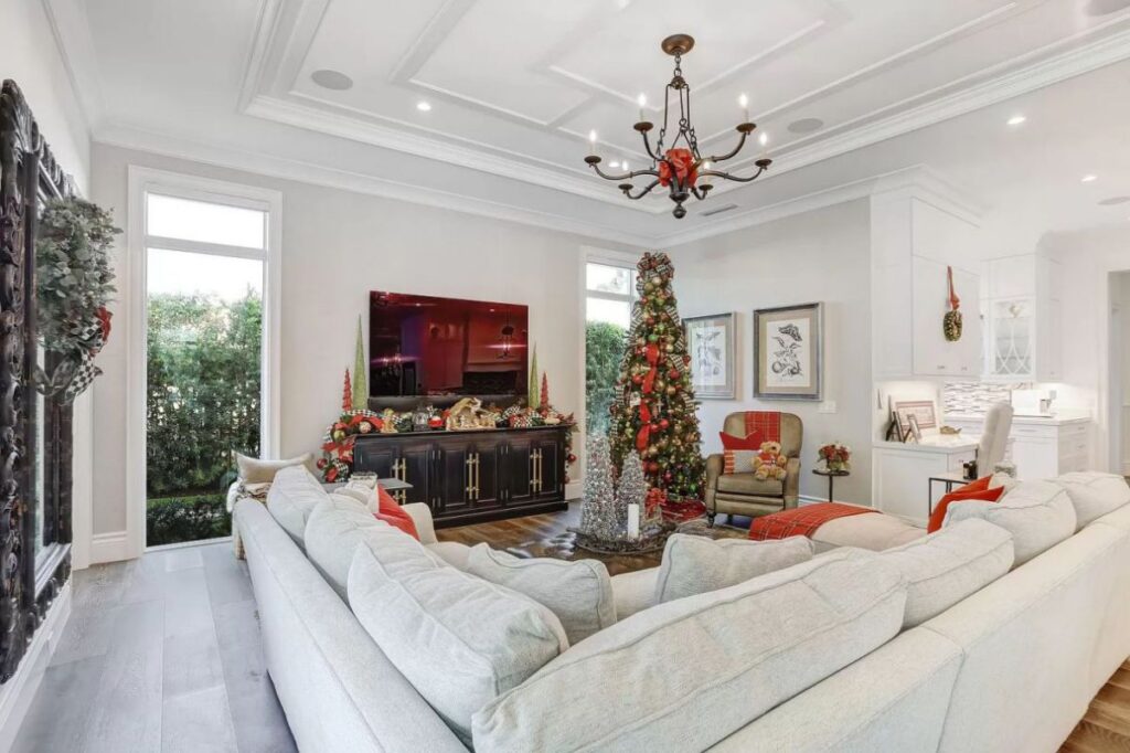 The Home for Sale in Boca Raton is a luxurious home with with specimen palms, is prelude to an up-lit mature tropical landscape, hedged and gated for privacy. This home located at 1717 Sabal Palm Dr, Boca Raton, Florida; offering 5 bedrooms and 9 bathrooms with over 6,800 square feet of living spaces.