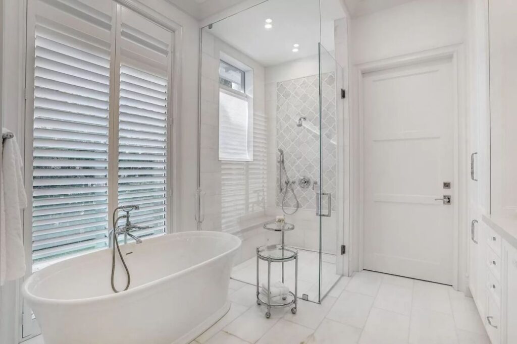 The Home for Sale in Boca Raton is a luxurious home with with specimen palms, is prelude to an up-lit mature tropical landscape, hedged and gated for privacy. This home located at 1717 Sabal Palm Dr, Boca Raton, Florida; offering 5 bedrooms and 9 bathrooms with over 6,800 square feet of living spaces.