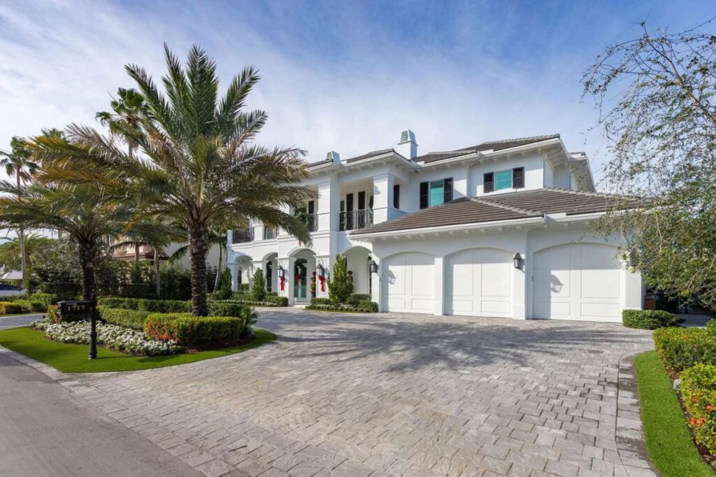 The Home for Sale in Boca Raton is a luxurious home with with specimen palms, is prelude to an up-lit mature tropical landscape, hedged and gated for privacy. This home located at 1717 Sabal Palm Dr, Boca Raton, Florida; offering 5 bedrooms and 9 bathrooms with over 6,800 square feet of living spaces.