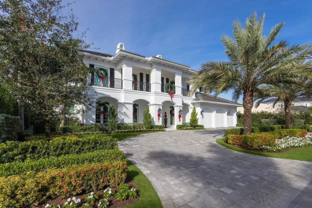 The Home for Sale in Boca Raton is a luxurious home with with specimen palms, is prelude to an up-lit mature tropical landscape, hedged and gated for privacy. This home located at 1717 Sabal Palm Dr, Boca Raton, Florida; offering 5 bedrooms and 9 bathrooms with over 6,800 square feet of living spaces.