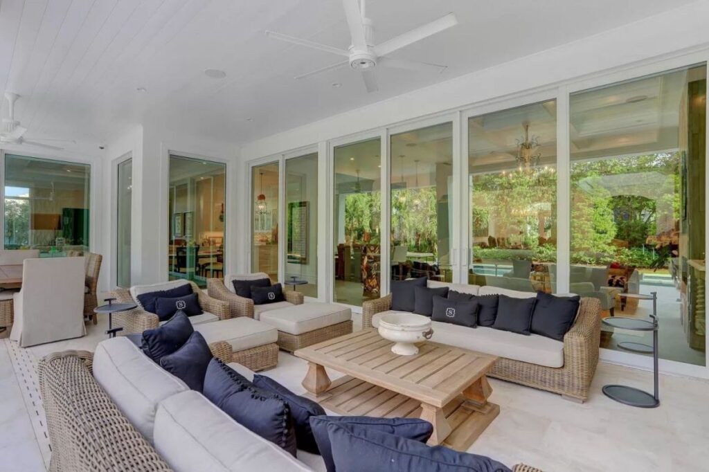 The Home for Sale in Boca Raton is a luxurious home with with specimen palms, is prelude to an up-lit mature tropical landscape, hedged and gated for privacy. This home located at 1717 Sabal Palm Dr, Boca Raton, Florida; offering 5 bedrooms and 9 bathrooms with over 6,800 square feet of living spaces.