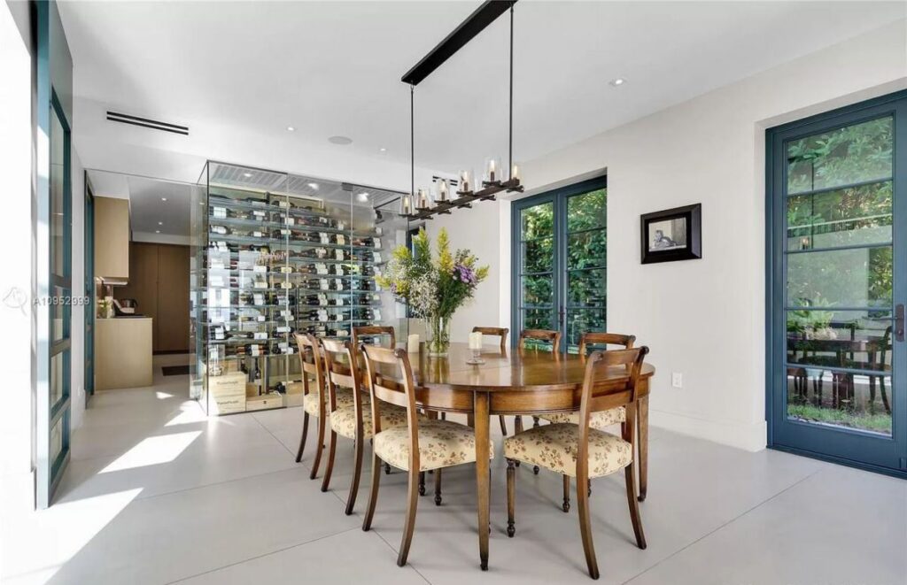 The House in Key Biscayne is a luxurious waterfront estate with spectacular daily sunset views and exquisite decoration now available for sale. This home located at 610 S Mashta Dr, Key Biscayne, Florida; offering 7 bedrooms and 7 bathrooms with over 6,400 square feet of living spaces.
