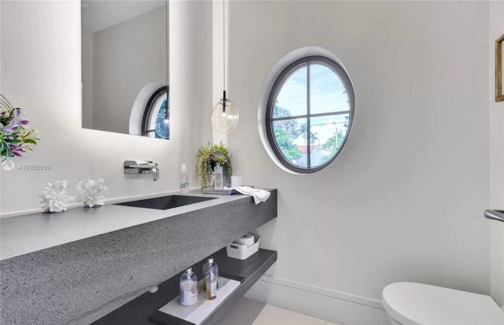 The House in Key Biscayne is a luxurious waterfront estate with spectacular daily sunset views and exquisite decoration now available for sale. This home located at 610 S Mashta Dr, Key Biscayne, Florida; offering 7 bedrooms and 7 bathrooms with over 6,400 square feet of living spaces.