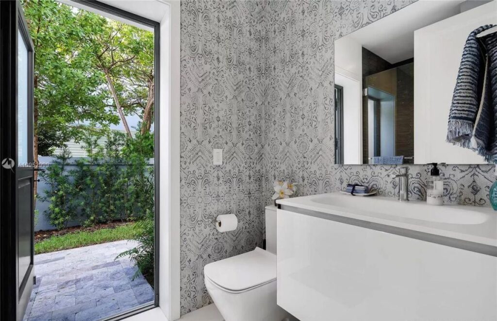 The House in Key Biscayne is a luxurious waterfront estate with spectacular daily sunset views and exquisite decoration now available for sale. This home located at 610 S Mashta Dr, Key Biscayne, Florida; offering 7 bedrooms and 7 bathrooms with over 6,400 square feet of living spaces.