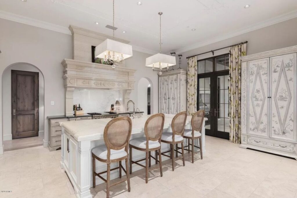 The Scottsdale Home is a stately Salcito and Dale Gardon architectural masterpiece now available for sale. This home located at 10244 E Hualapai Dr, Scottsdale, Arizona; offering 7 bedrooms and 8 bathrooms with over 8,700 square feet of living spaces.