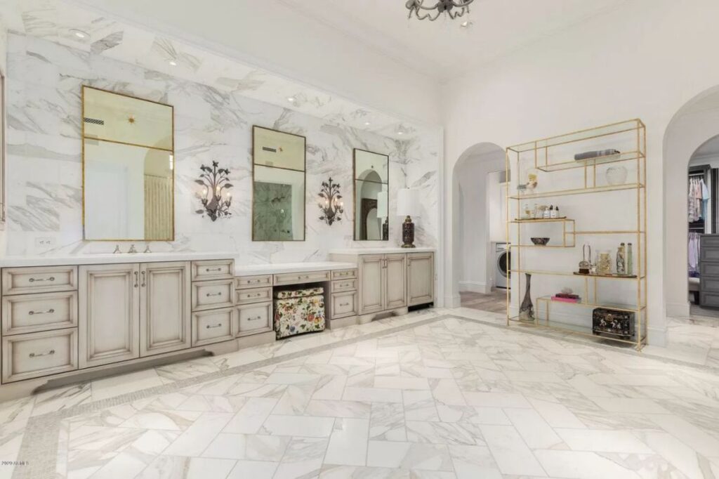 The Scottsdale Home is a stately Salcito and Dale Gardon architectural masterpiece now available for sale. This home located at 10244 E Hualapai Dr, Scottsdale, Arizona; offering 7 bedrooms and 8 bathrooms with over 8,700 square feet of living spaces.