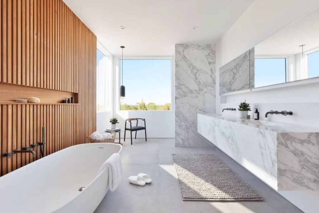 The House in New York is a luxurious new modern designed by renowned West Chin Architects provides every amenity for luxurious living now available for sale. This home located at 31 Startop Dr, Montauk, New York; offering 4 bedrooms and 7 bathrooms with over 5,000 square feet of living spaces.