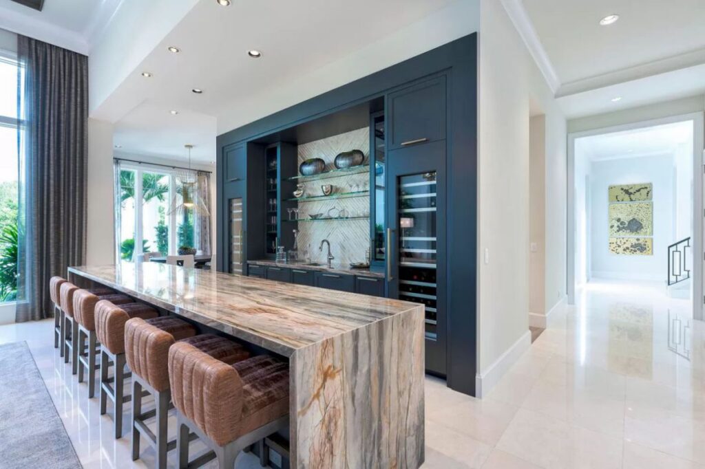 The Florida Home is an unique property with exquisite detail and impeccable design now available for sale. This home located at 111 Clipper Ln, Jupiter, Florida; offering 4 bedrooms and 8 bathrooms with over 7,700 square feet of living spaces. 