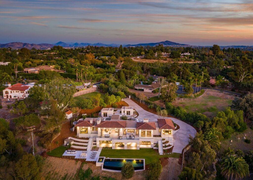 The Rancho Santa Fe Home is a luxurious 2020 modern architecture maximize the exceptional west-facing views now available for sale. This home located at 5870 San Elijo Ave, Rancho Santa Fe, California; offering 6 bedrooms and 9 bathrooms with over 8,500 square feet of living spaces.