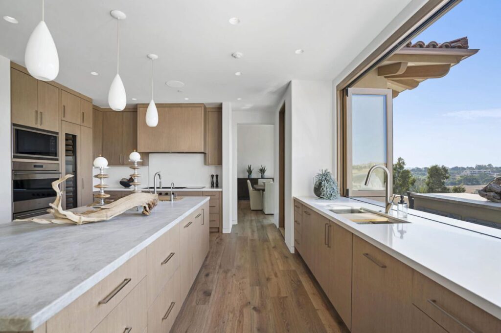 The Rancho Santa Fe Home is a luxurious 2020 modern architecture maximize the exceptional west-facing views now available for sale. This home located at 5870 San Elijo Ave, Rancho Santa Fe, California; offering 6 bedrooms and 9 bathrooms with over 8,500 square feet of living spaces.