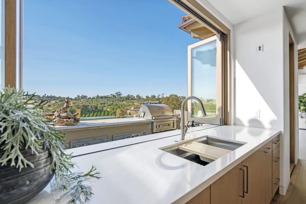 The Rancho Santa Fe Home is a luxurious 2020 modern architecture maximize the exceptional west-facing views now available for sale. This home located at 5870 San Elijo Ave, Rancho Santa Fe, California; offering 6 bedrooms and 9 bathrooms with over 8,500 square feet of living spaces.