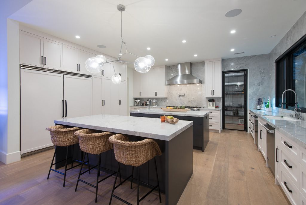 The Hidden Hills House is an absolutely extraordinary single story modern with explosive panoramic unobstructed city light views now available for sale. This home located at 5550 Bonneville Rd, Hidden Hills, California; offering 4 bedrooms and 5 bathrooms with over 4,800 square feet of living spaces.