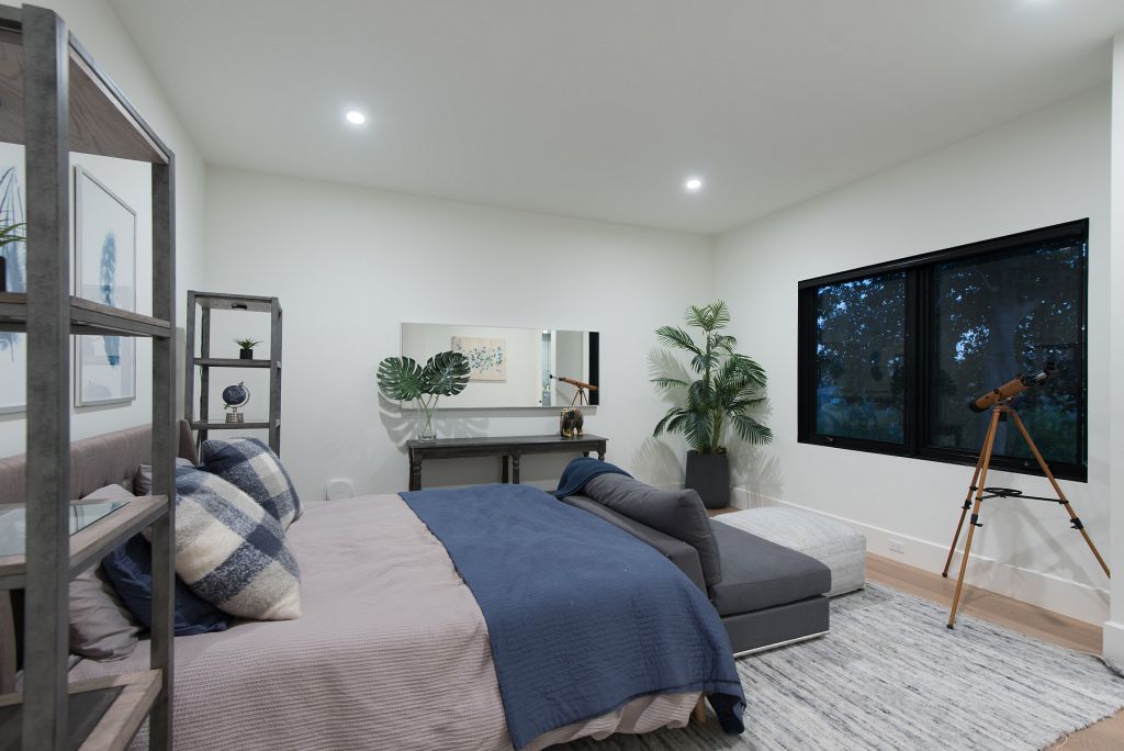 The Hidden Hills House is an absolutely extraordinary single story modern with explosive panoramic unobstructed city light views now available for sale. This home located at 5550 Bonneville Rd, Hidden Hills, California; offering 4 bedrooms and 5 bathrooms with over 4,800 square feet of living spaces.