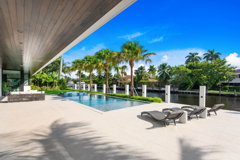 The Fort Lauderdale House is a luxurious property has amazing pool and waterfront views of stunning simplicity and sophistication now available for sale. This home located at 188 Nurmi Dr, Fort Lauderdale, Florida; offering 6 bedrooms and 7 bathrooms with over 7,500 square feet of living spaces.