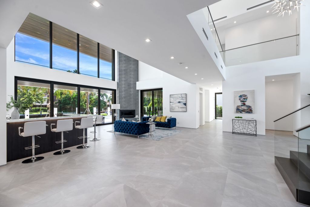 The Fort Lauderdale House is a luxurious property has amazing pool and waterfront views of stunning simplicity and sophistication now available for sale. This home located at 188 Nurmi Dr, Fort Lauderdale, Florida; offering 6 bedrooms and 7 bathrooms with over 7,500 square feet of living spaces.