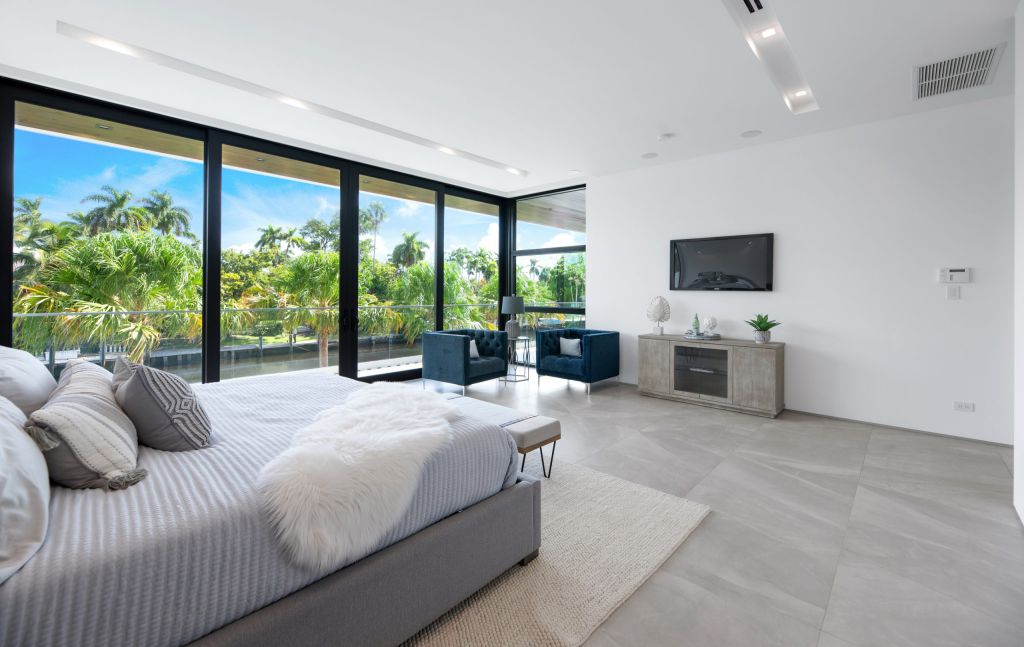 The Fort Lauderdale House is a luxurious property has amazing pool and waterfront views of stunning simplicity and sophistication now available for sale. This home located at 188 Nurmi Dr, Fort Lauderdale, Florida; offering 6 bedrooms and 7 bathrooms with over 7,500 square feet of living spaces.