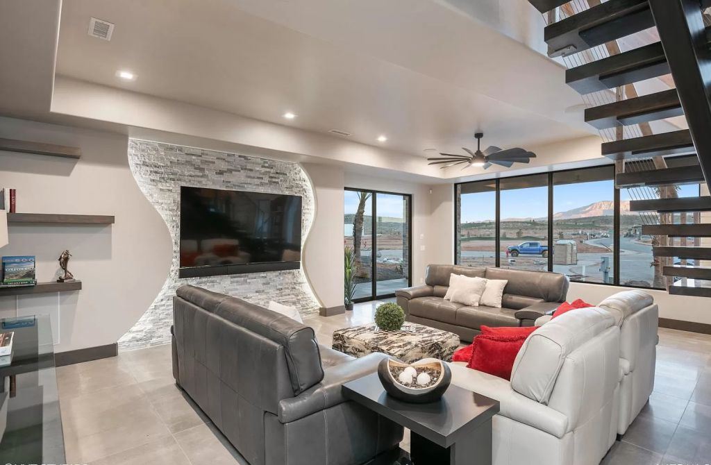 The Home in Utah is a luxurious home boasts the finest of finishes and taste in every square inch now available for sale. This home located at 3652 S Cypress Point Rd, Hurricane, Utah; offering 4 bedrooms and 5 bathrooms with over 6,000 square feet of living spaces.
