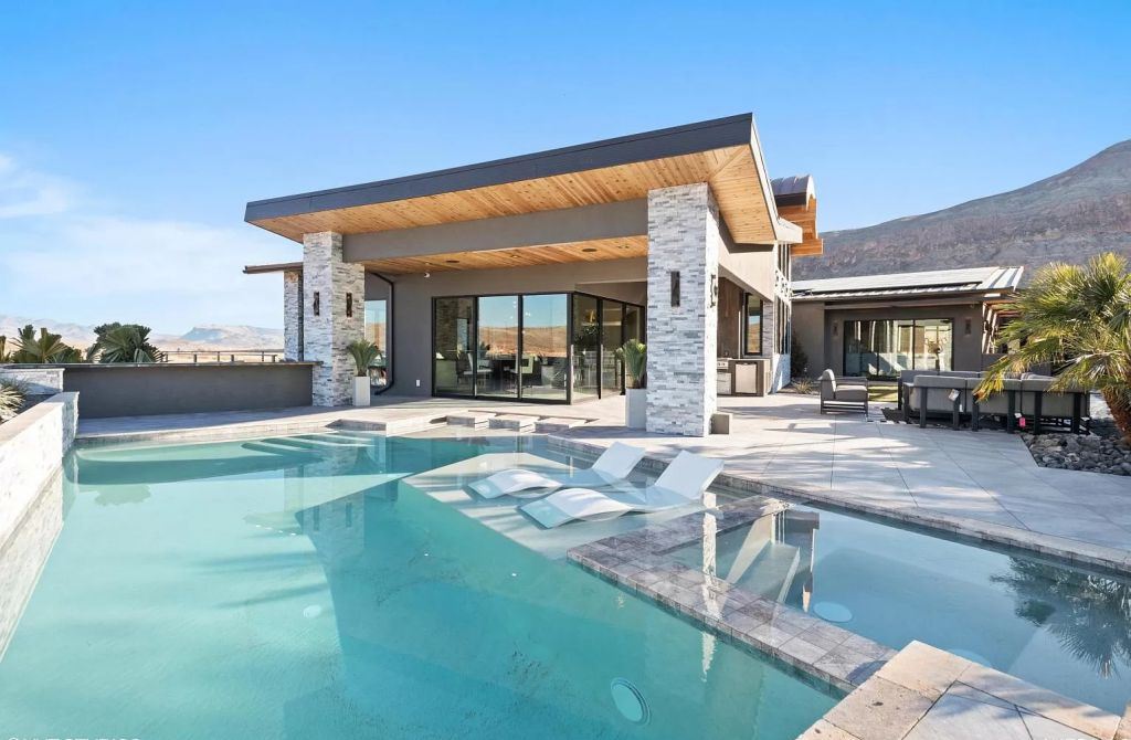 The Home in Utah is a luxurious home boasts the finest of finishes and taste in every square inch now available for sale. This home located at 3652 S Cypress Point Rd, Hurricane, Utah; offering 4 bedrooms and 5 bathrooms with over 6,000 square feet of living spaces.