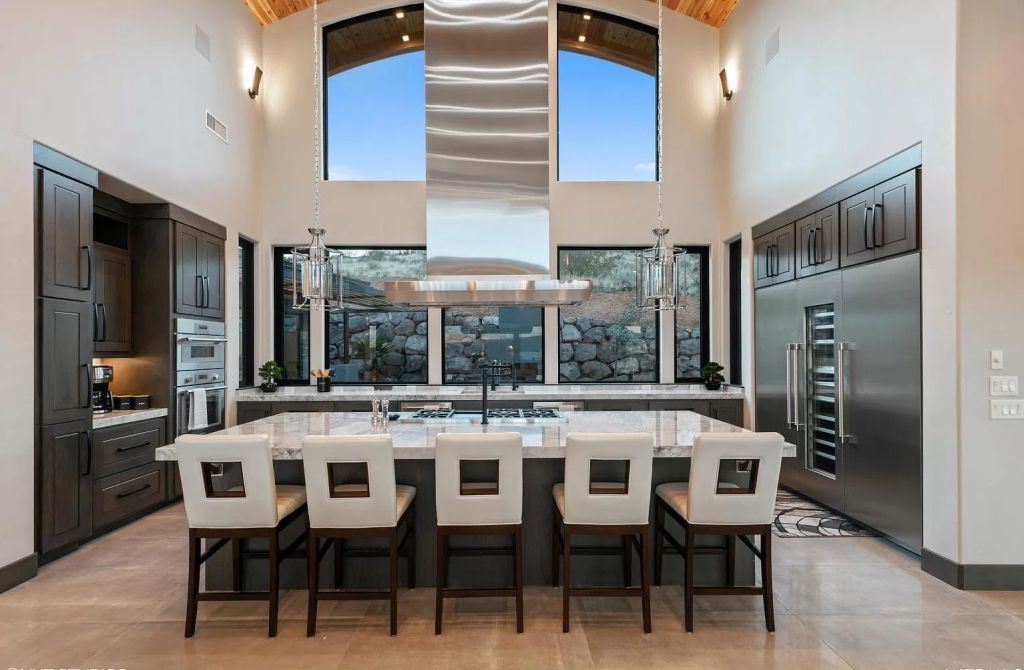 The Home in Utah is a luxurious home boasts the finest of finishes and taste in every square inch now available for sale. This home located at 3652 S Cypress Point Rd, Hurricane, Utah; offering 4 bedrooms and 5 bathrooms with over 6,000 square feet of living spaces.