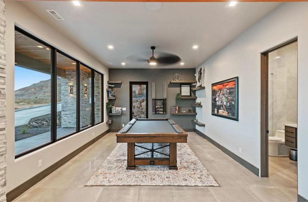 The Home in Utah is a luxurious home boasts the finest of finishes and taste in every square inch now available for sale. This home located at 3652 S Cypress Point Rd, Hurricane, Utah; offering 4 bedrooms and 5 bathrooms with over 6,000 square feet of living spaces.