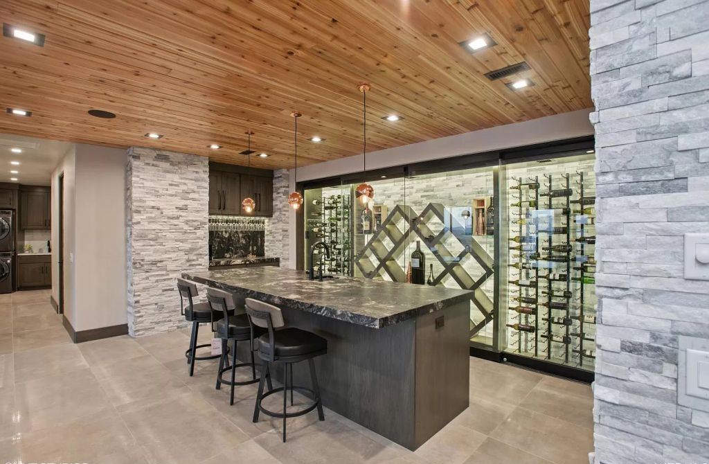 The Home in Utah is a luxurious home boasts the finest of finishes and taste in every square inch now available for sale. This home located at 3652 S Cypress Point Rd, Hurricane, Utah; offering 4 bedrooms and 5 bathrooms with over 6,000 square feet of living spaces.